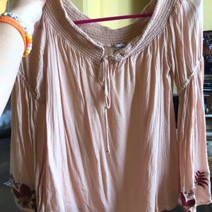 off the shoulder pale pink blouse